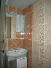 Облицовка кафелем,  искусственным камнем