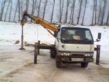 Услуги Ямобура   крана(два в одном) Японец «Mitsubisi Canter»