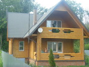 Изготовляем срубы из оцилиндрованного бревна.